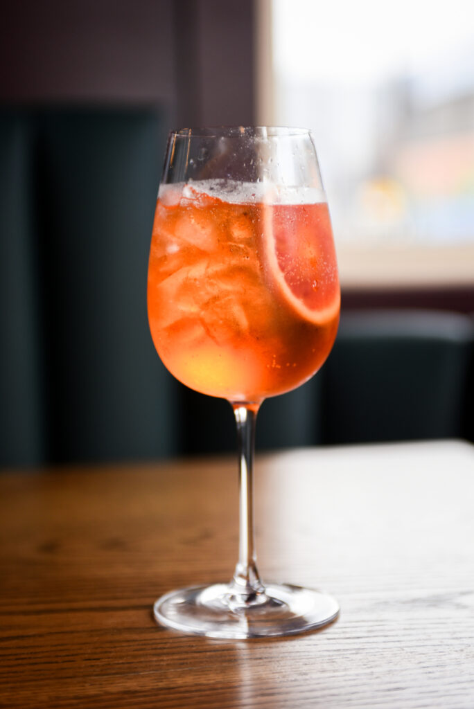 aperol spritz garnished with citrus